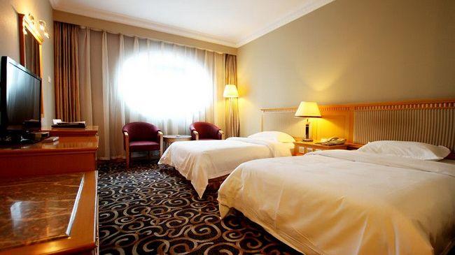Modern Hotel Harbin Kamer foto